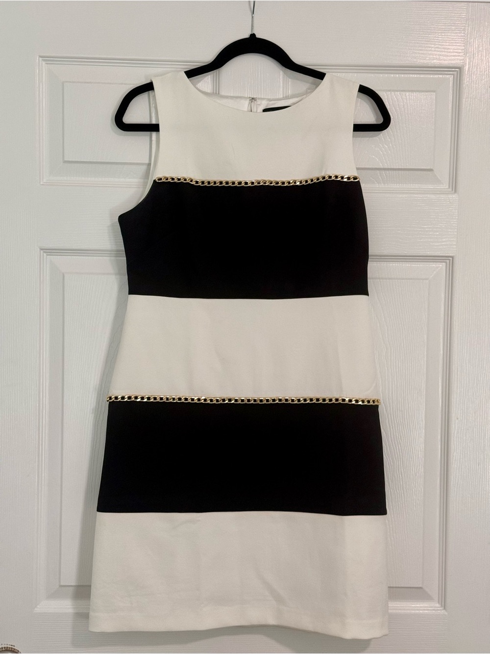 Classic Black and White Sleeveless Shift Dress with Gold Trim